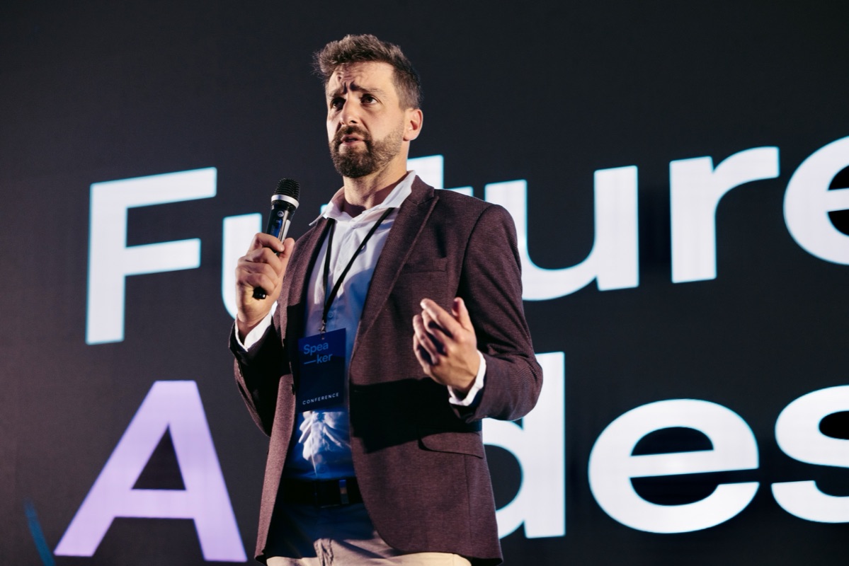 Alex, speaking at a conference